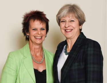 Anne Milton and Theresa May